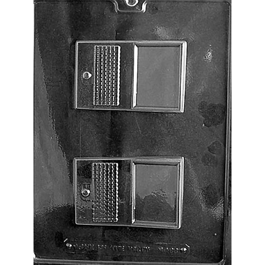 Clear plastic chocolate mold with two laptop-shaped cavities, each showing an open screen rectangle and a textured keyboard panel.