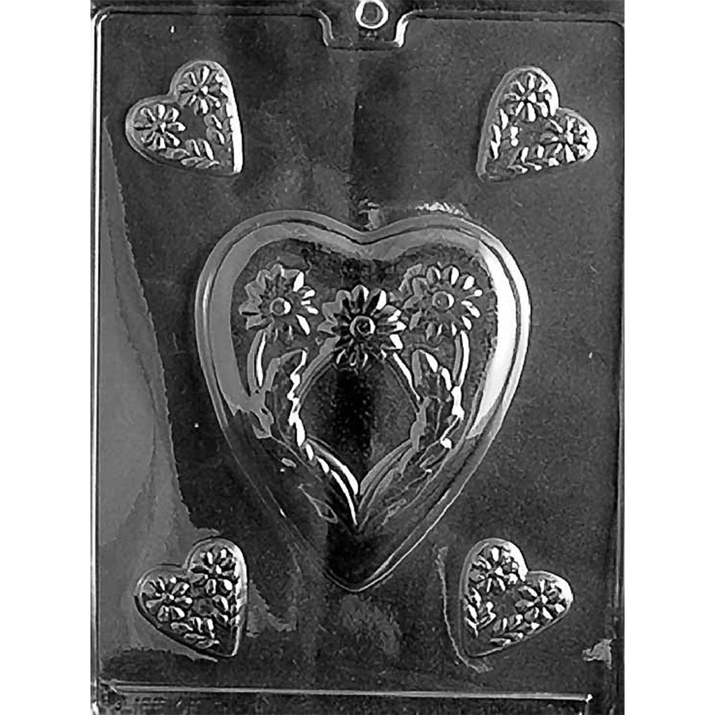 Clear plastic chocolate mold with one large heart featuring raised flowers and leaves, surrounded by four smaller floral heart cavities.