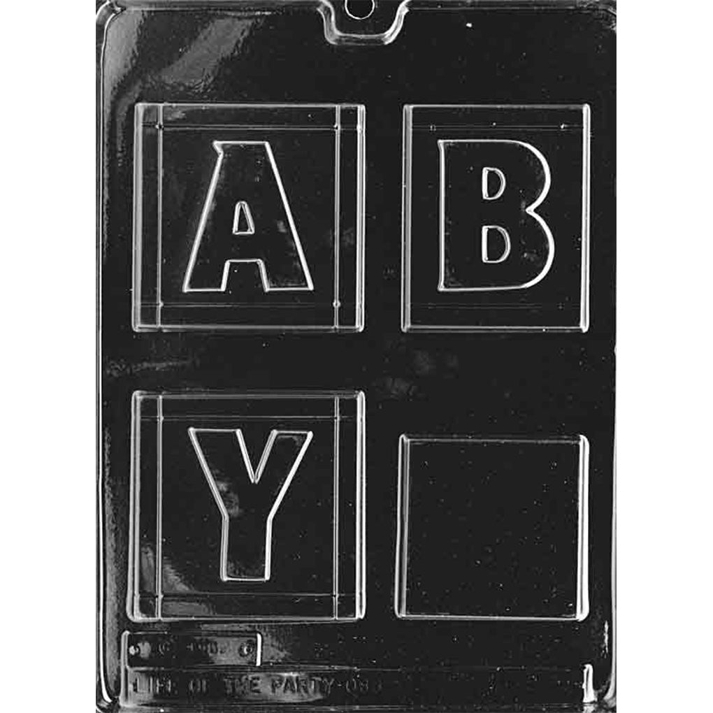 Clear plastic chocolate mold with four large baby block cavities, showing raised letter faces including A, B, and Y and one blank square face, photographed on a dark background.