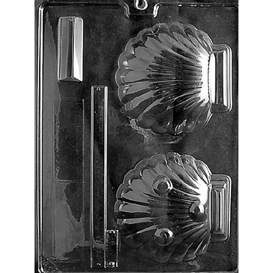 Clear plastic chocolate mold photographed on a black background with two large clam shell cavities, each showing deep ridges and a rounded shell shape.