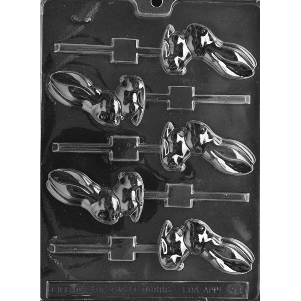 Clear plastic chocolate mold with multiple bunny-shaped cavities in side profile, featuring long upright ears, a rounded face, and built-in stick-style channels visible on a dark background.