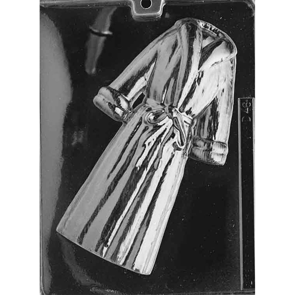Clear plastic chocolate mold featuring one large cavity shaped like a long fur-style coat with a collar, sleeves, and a tied belt at the waist, shown on a dark background.