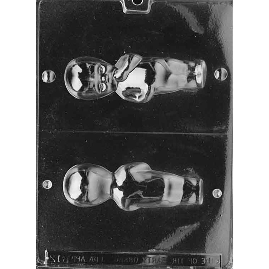 Clear plastic 3D chocolate mold photographed on a black background with two large doll-shaped halves, showing a vintage-style Kewpie doll figure with a rounded head and small body.