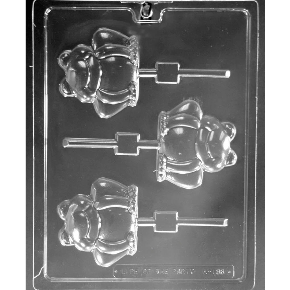 Clear plastic chocolate lollipop mold with three large frog-shaped cavities, each showing a smiling frog with rounded features and a stick channel.