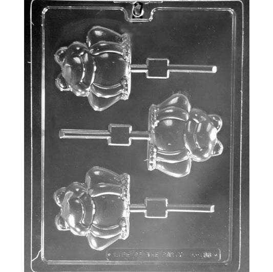 Clear plastic chocolate lollipop mold with three large frog-shaped cavities, each showing a smiling frog with rounded features and a stick channel.