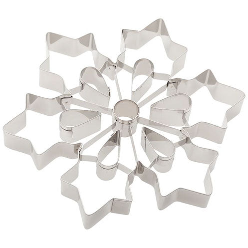 Stainless steel snowflake cookie cutter with intricate star and teardrop-shaped segments forming a symmetrical design.