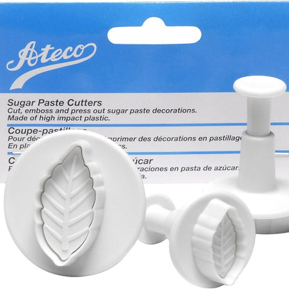 Close-up of Ateco leaf plunger cutter set with packaging, showing embossed leaf detail on cutter heads.