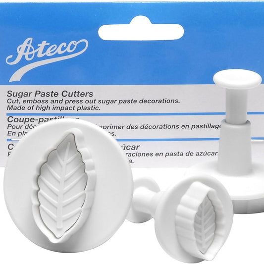Close-up of Ateco leaf plunger cutter set with packaging, showing embossed leaf detail on cutter heads.