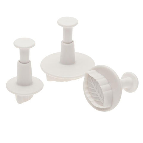Set of three plastic leaf plunger cutters in different sizes, used for fondant and sugar paste decorations.