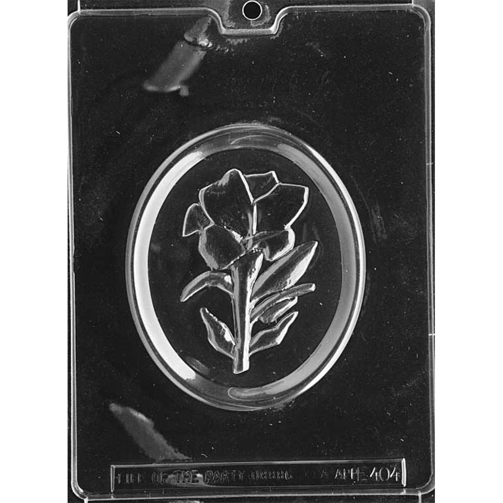 Single-cavity lily flower chocolate mold forming a 5 3/4-inch oval plaque with a raised double border, lily bloom, stem, and leaves