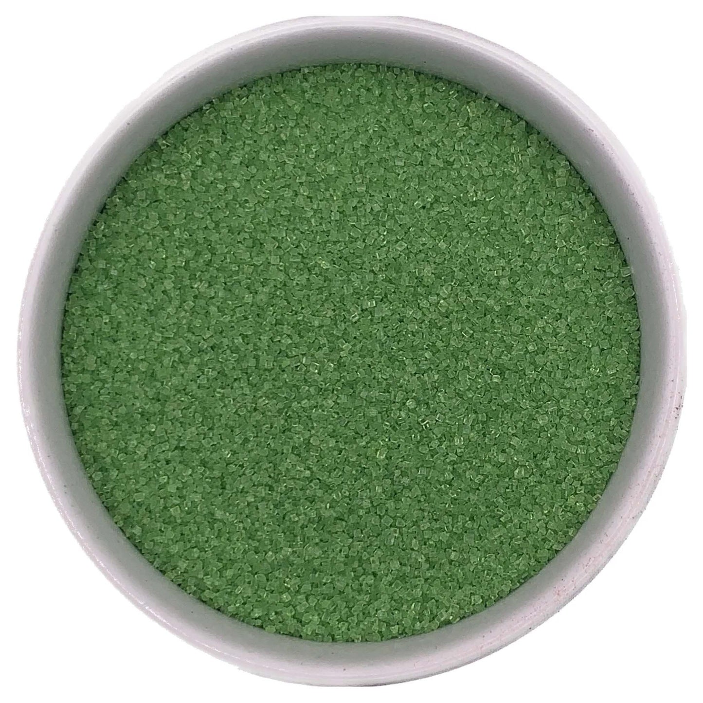 Lime green fine sanding sugar crystals in a white bowl on a white background.