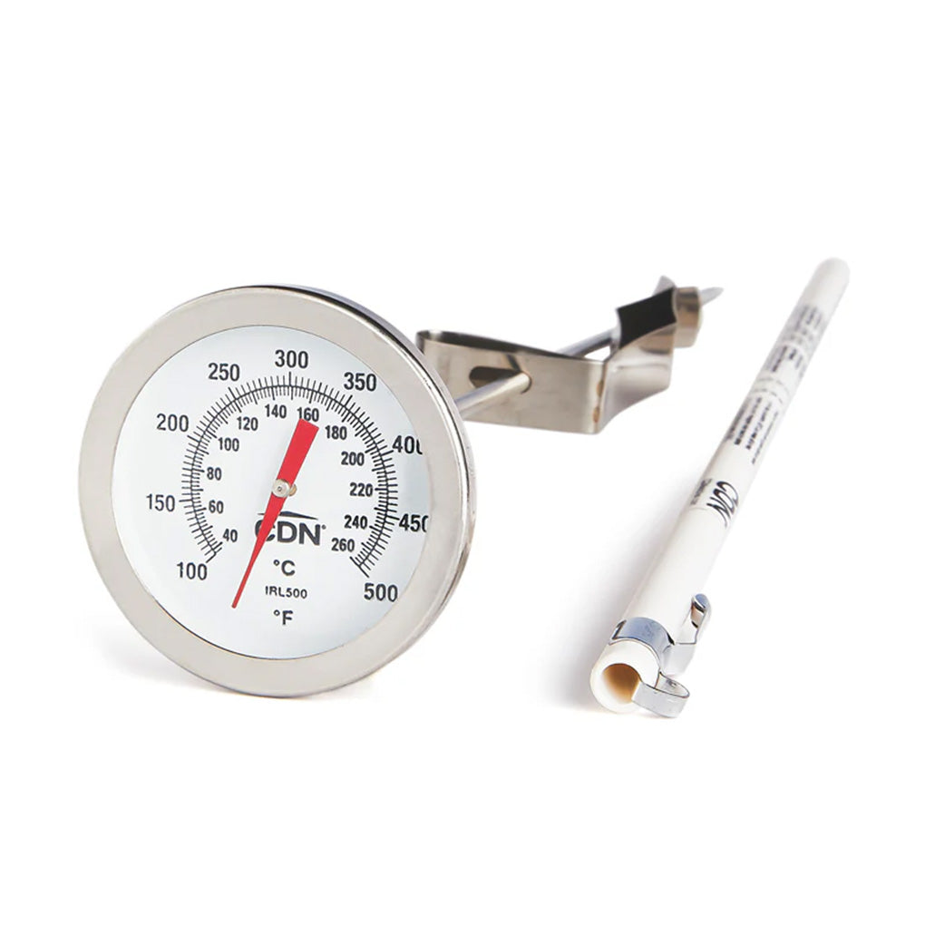 Long stem candy thermometer with a round dial face showing Fahrenheit and Celsius scales, stainless steel pot clip, and a white protective sheath on a white background.