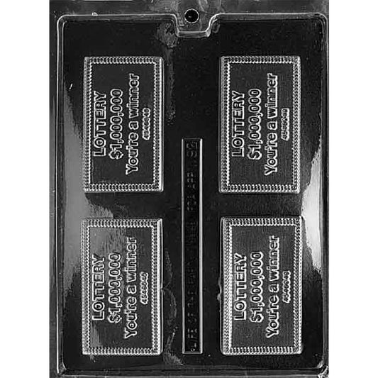 Clear chocolate mold with four rectangular lottery ticket cavities featuring raised “LOTTERY $1,000,000 You’re a Winner” lettering and decorative borders.