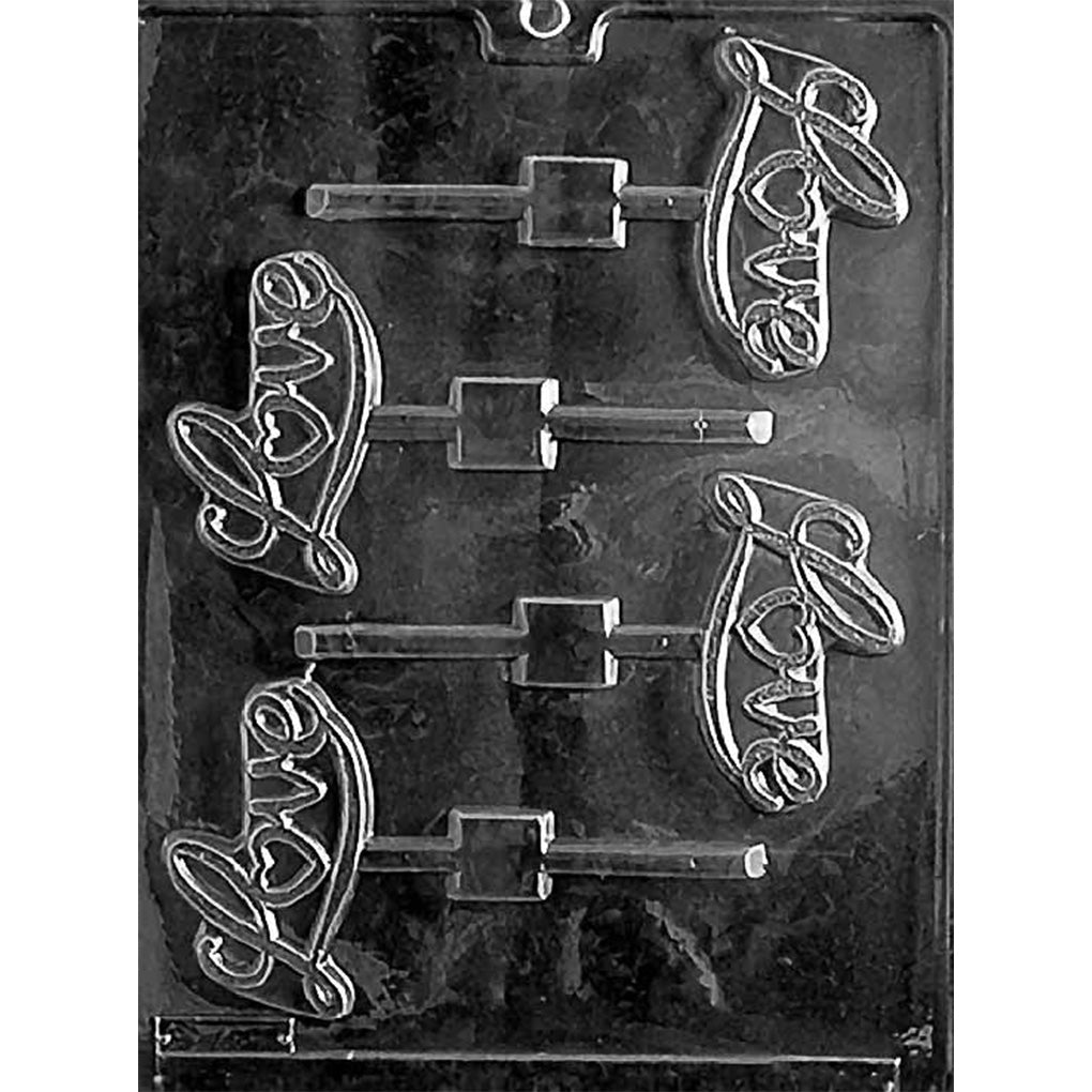 Clear plastic chocolate lollipop mold with four cavities shaped like the word “Love” in cursive script, each connected to a lollipop stick channel.