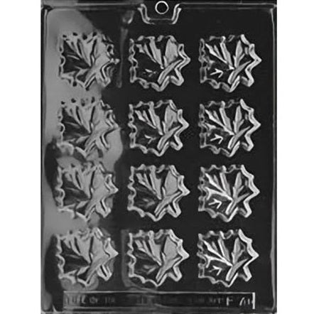 Clear chocolate mold with 12 maple leaf-shaped cavities arranged in rows, each featuring pointed edges and leaf vein lines on a dark background.