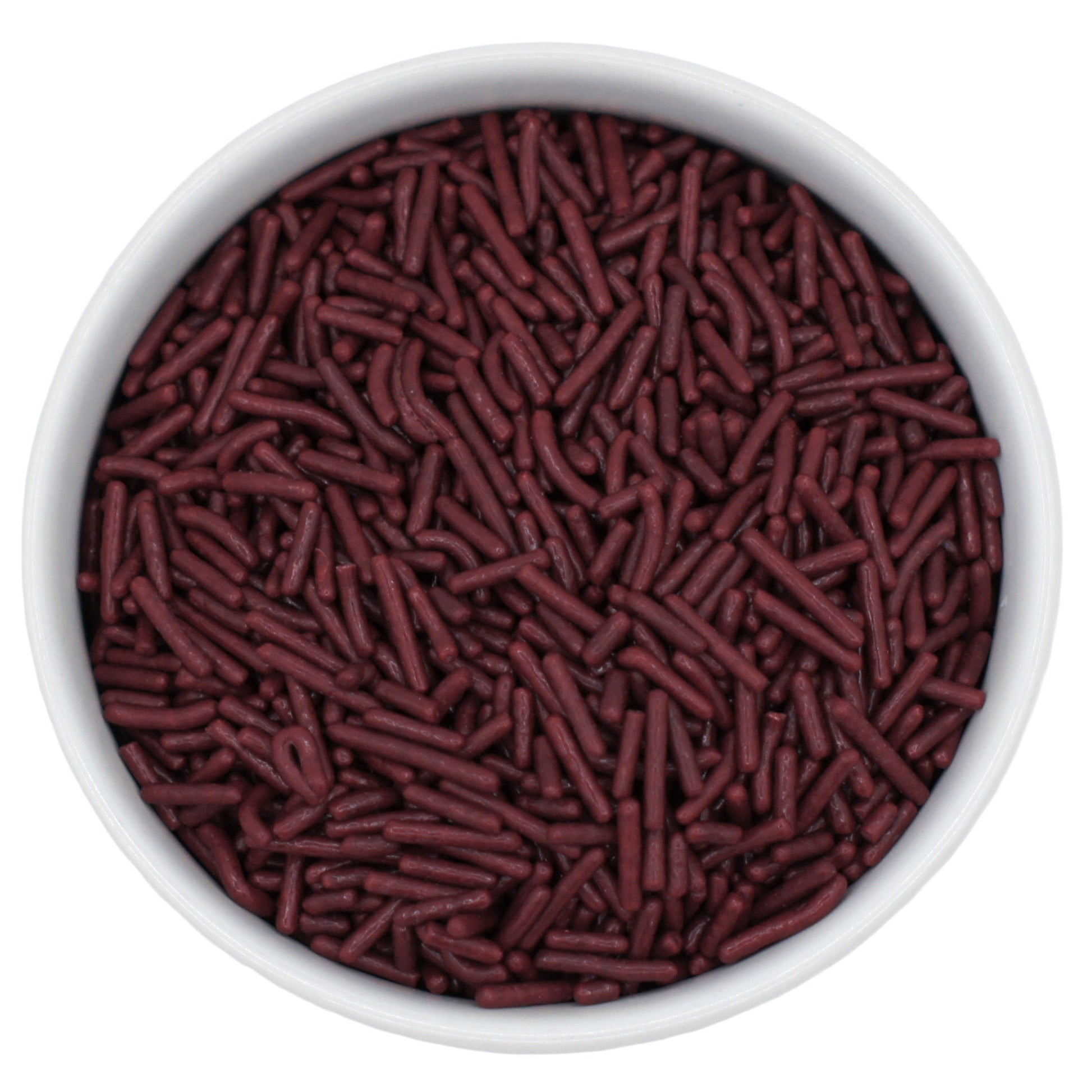 Top-down close-up of a white bowl filled with maroon jimmies sprinkles.