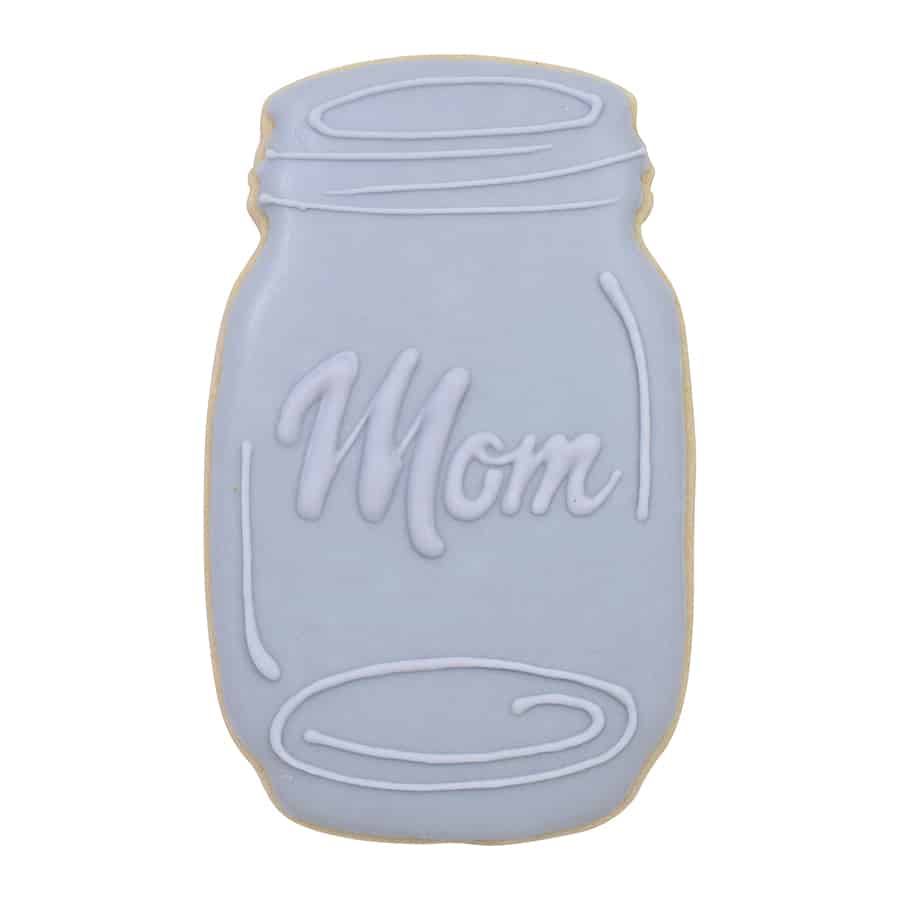 Light blue iced cookie decorated as a mason jar, with "Mom" written in elegant script.