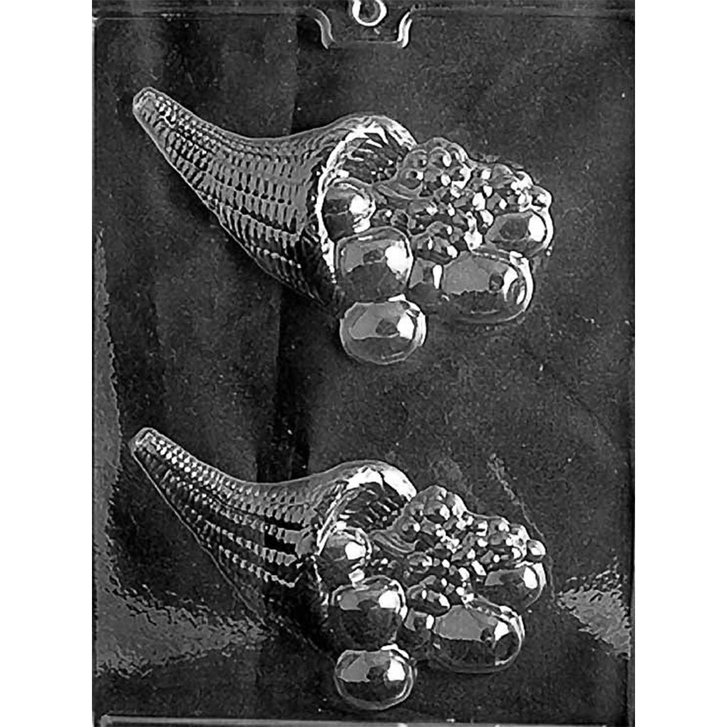 Clear plastic chocolate mold with two medium cornucopia-shaped cavities featuring a textured wicker horn and a cluster of fruit spilling from the opening.
