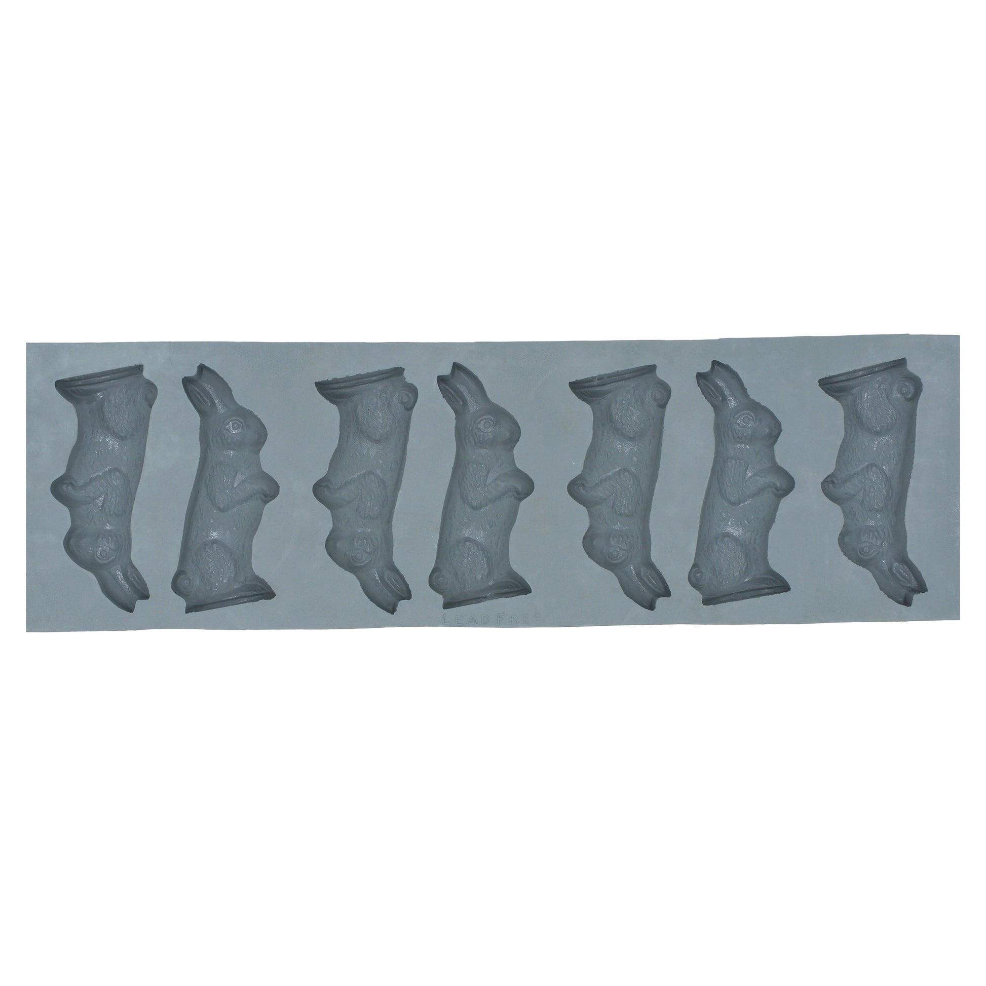 Full sheet of 20 small rabbit-shaped cavities in a natural rubber mold, ideal for Easter treats, baby showers, or seasonal candy making.