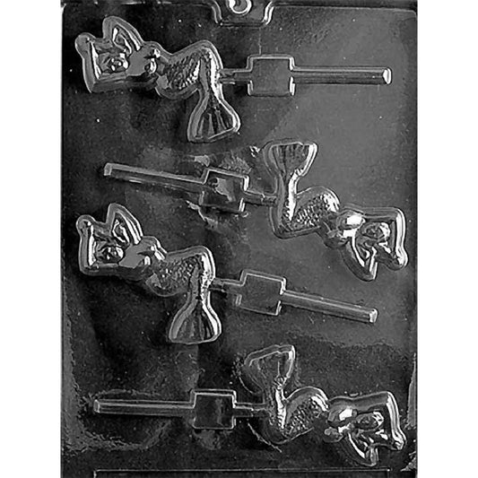 Clear plastic mermaid chocolate lollipop mold photographed on a dark background, showing mermaid-shaped cavities with flowing hair, curved tails, and built-in stick grooves.