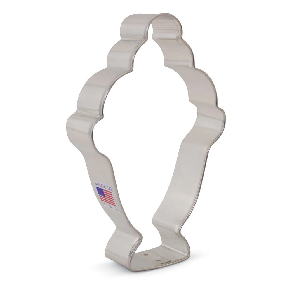 Silver cookie cutter with a dual-purpose shape for making mermaid or ice cream sundae cookies.