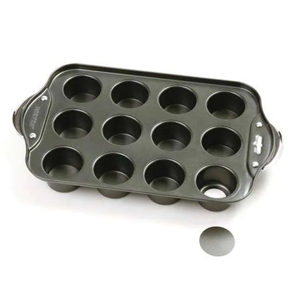 12-hole mini cheesecake pan with nonstick finish and a removable round bottom disk shown beside it.