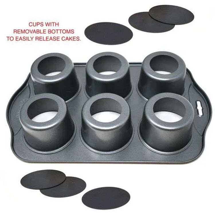 Underside view of the six-cavity mini cheesecake pan showing raised cup shapes and several round removable bottom disks, with text indicating the cups have removable bottoms for cake release.