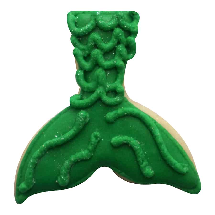 Decorated mermaid tail-shaped cookie with green icing and textured scale details, made using the Mini Mermaid Tail Cookie Cutter.