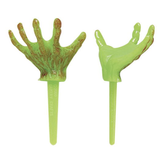 Two plastic Halloween zombie hand cupcake picks in light green with realistic red detailing.