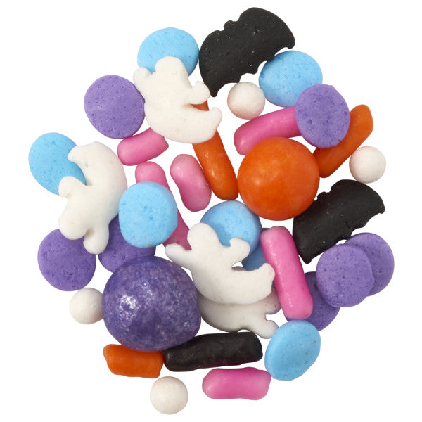 Close-up of Monster Mash Deluxe Sprinkle Blend featuring colorful Halloween-themed shapes including white ghosts, black bats, orange balls, and pink, blue, and purple confetti.