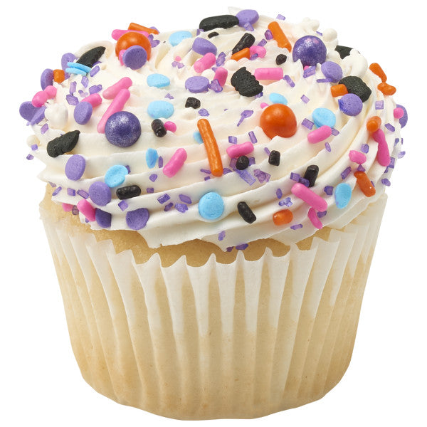 Vanilla cupcake topped with white frosting and decorated with Monster Mash Deluxe Sprinkle Blend, featuring colorful ghosts, bats, and confetti sprinkles.