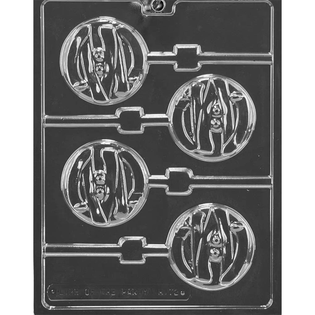 Clear plastic chocolate lollipop mold with five round cavities featuring mummy face designs with wrapped bandage details and exposed eyes, shown on a dark background.