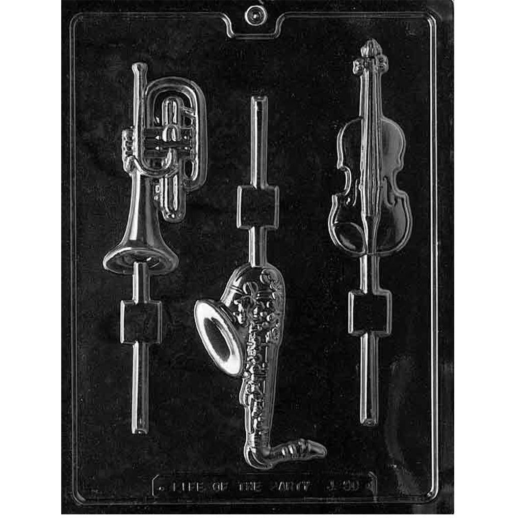 Clear plastic musical instrument chocolate lollipop mold with three cavities shaped like a saxophone, violin, and coiled brass instrument with built-in stick channels
