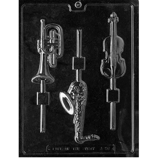 Clear plastic musical instrument chocolate lollipop mold with three cavities shaped like a saxophone, violin, and coiled brass instrument with built-in stick channels