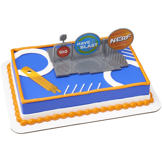 Nerf cake topper set featuring three colorful targets with playful "Have a Blast" and "100" graphics, including an orange launcher accessory, perfect for decorating Nerf-themed cakes.
