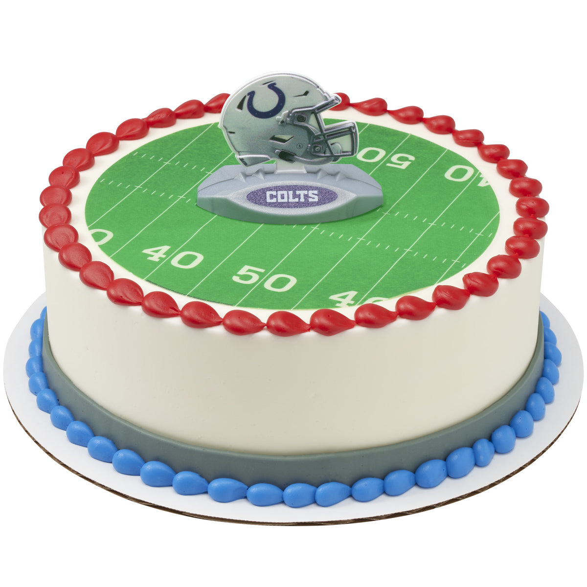 A round cake decorated to look like a football field, with a green turf top, red piped border, blue base trim, and a Colts helmet topper on a white background.