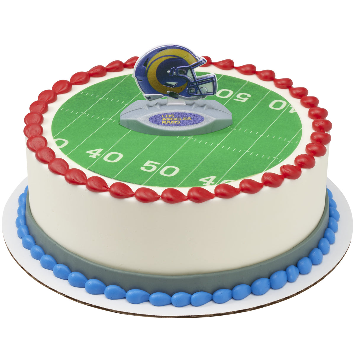A round cake decorated with a football field design, red and blue piped borders, and a helmet topper on top, shown on a white background.