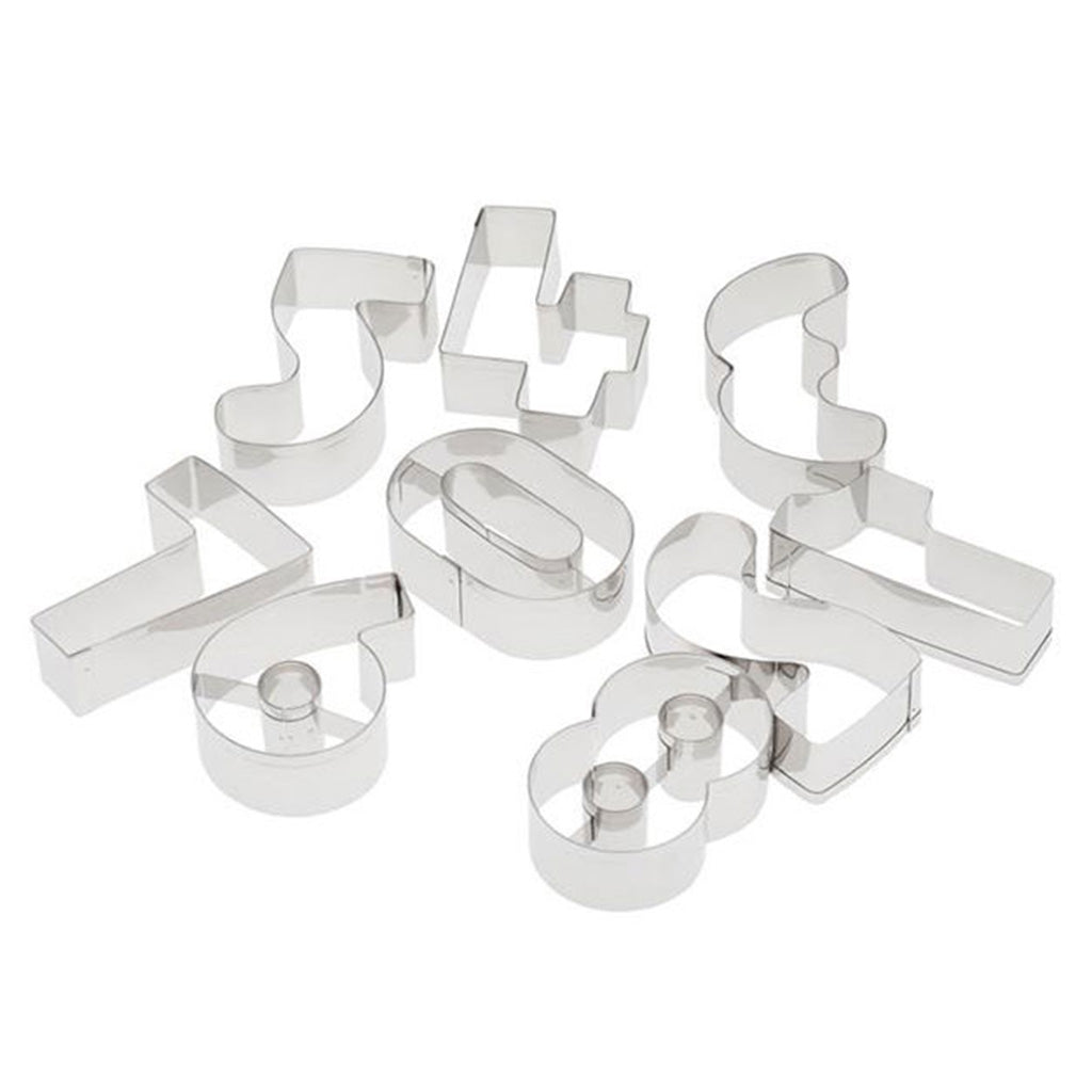 Set of nine stainless steel number cookie cutters arranged randomly on a white background.