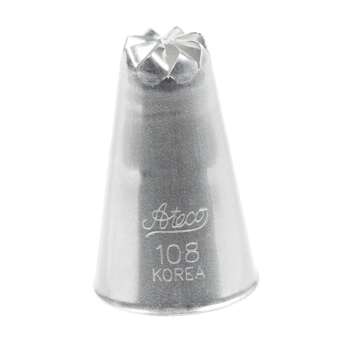 Close-up of the Ateco 108 Drop Flower Piping Tip, featuring a small star-shaped opening designed for piping compact buttercream flowers and decorative accents.