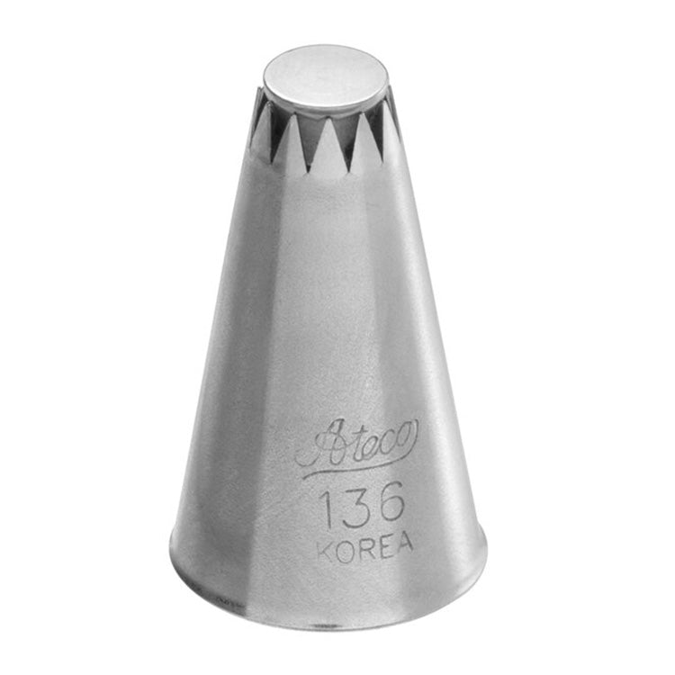Ateco 136 drop flower piping tip with a small star-shaped opening and center bar, engraved with branding and number, shown upright on a white background.
