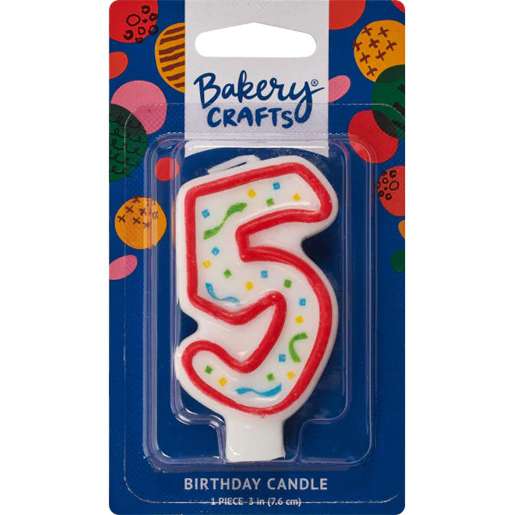 Packaged number 5 birthday candle with a white center, red outline, and multicolor confetti sprinkles on a blue Bakery Crafts card.