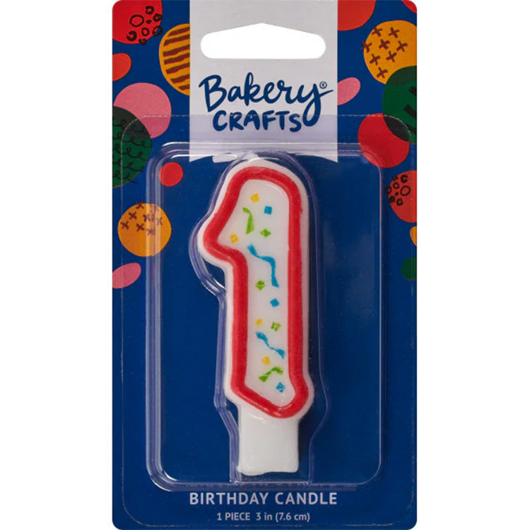Packaged number 1 birthday candle with a white center, red outline, and multicolor confetti sprinkles on a blue Bakery Crafts card.