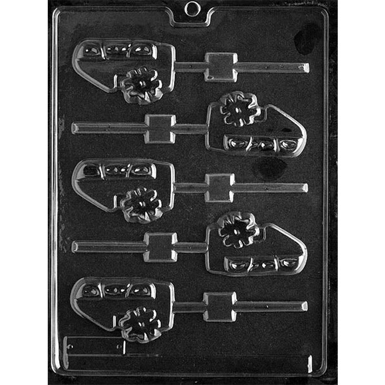 Clear plastic chocolate lollipop mold with five cavities shaped like a “#1 DAD” message plaque, each with a stick channel, shown on a dark background.