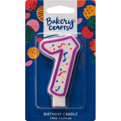 Packaged number 7 birthday candle with a purple outline and colorful confetti center on a blue Bakery Crafts backing card with multicolor dots.
