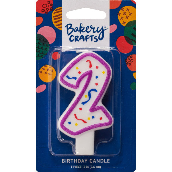 Packaged number 2 birthday candle with a purple outline and colorful confetti center on a blue Bakery Crafts backing card with multicolor dots.