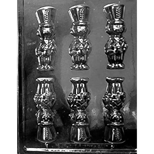 Clear plastic Toy Soldier Chocolate Mold shown against a black background with six nutcracker-style soldier cavities.