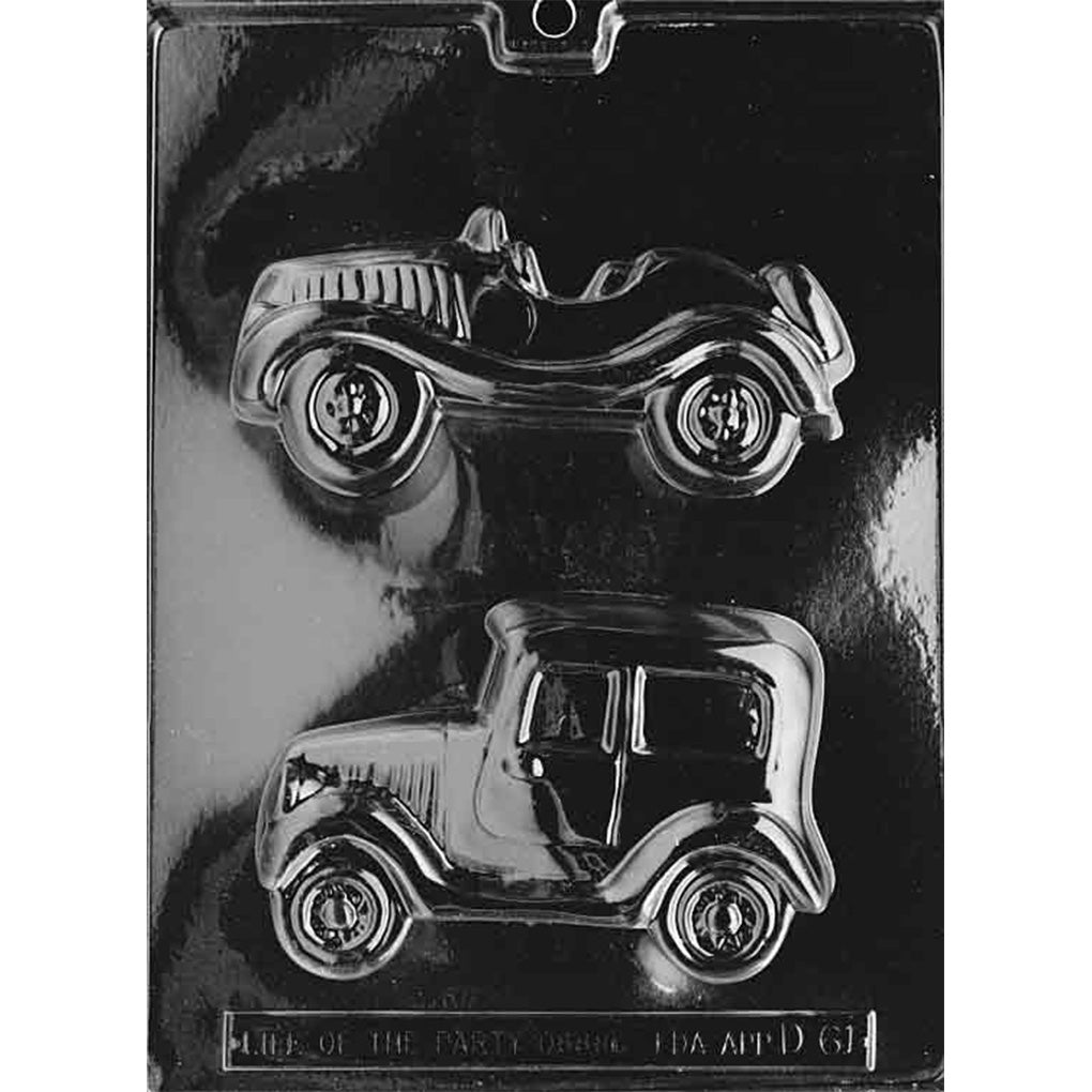 Clear plastic chocolate mold with two vintage car cavities, including a roadster and an old-fashioned coupe.