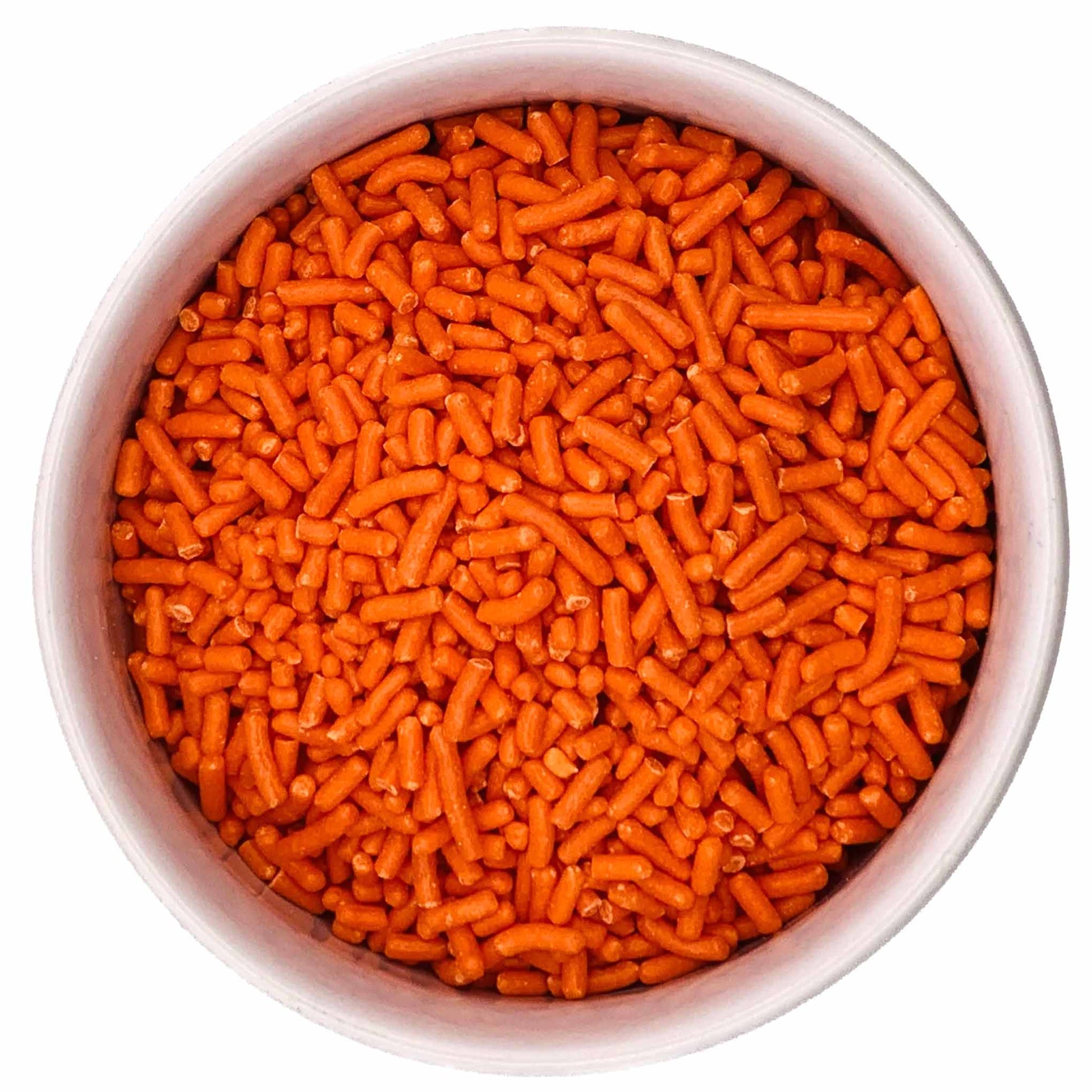 Top-down view of bright orange jimmies sprinkles in a white bowl, showing the classic rod-shaped sprinkle texture.