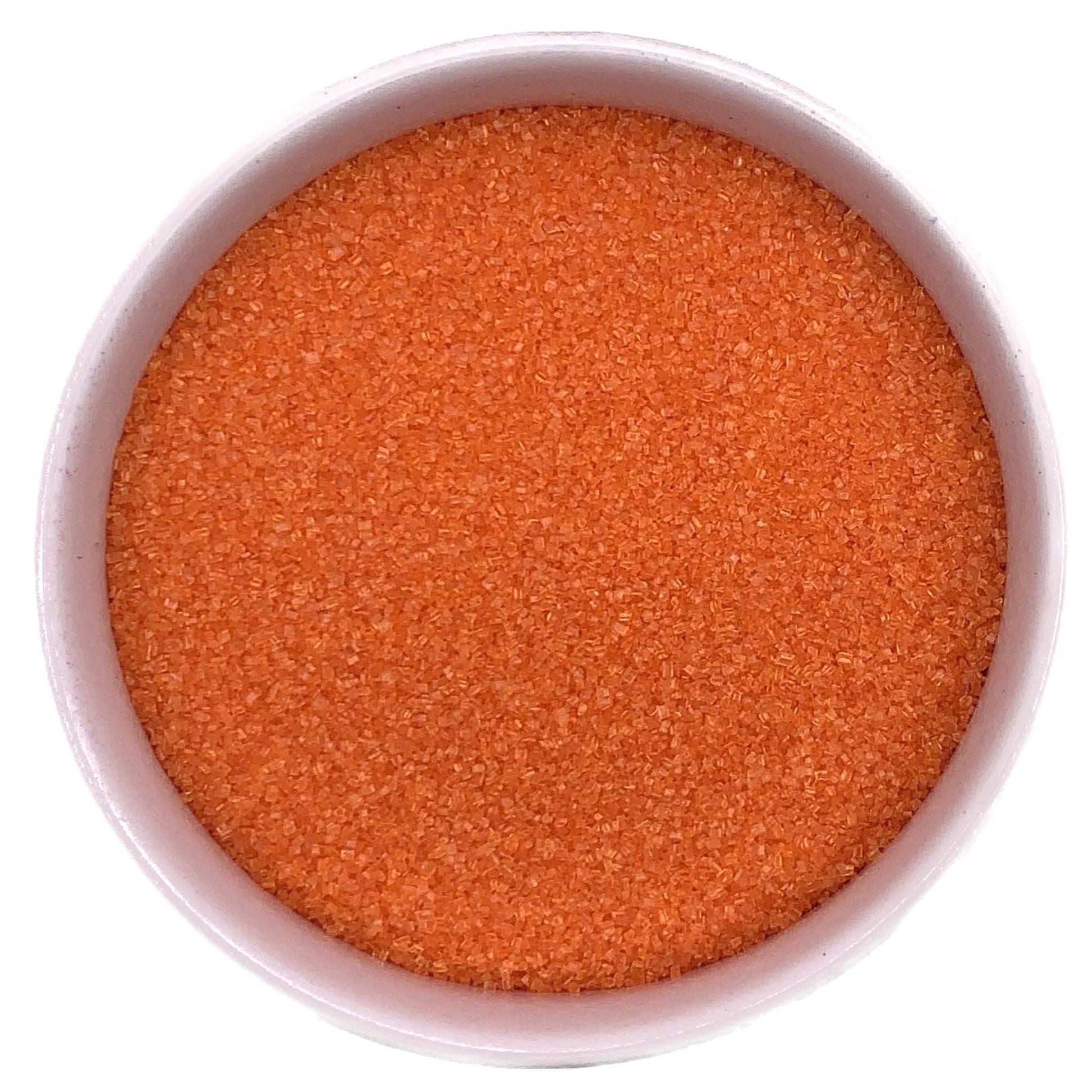 Top-down view of a white bowl filled with orange fine sanding sugar, showing tiny sparkling crystals in a bright tangerine-orange shade.