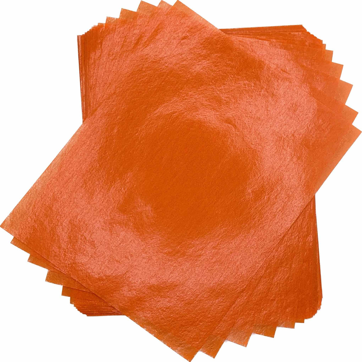 Overlapping stack of bright orange 4" x 5" wax caramel and taffy wrapper sheets displayed against a white background.